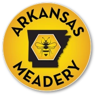 Arkansas Meadery logo featuring a honeybee and Arkansas silhouette